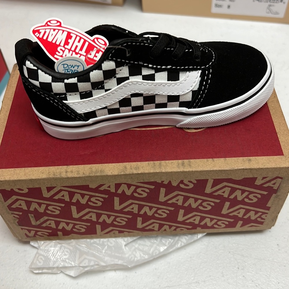 Brand new Black and white vans.